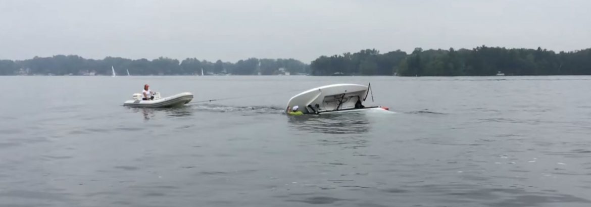Sailboat capsize and turtle recovery