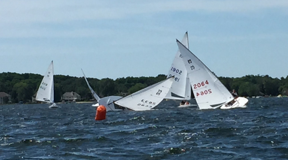 how to right a capsized laser sailboat